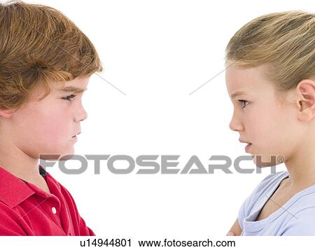 Brother and sister staring at each other View Large Photo Image Stock Image - Brother and sister staring at each other. Fotosearch