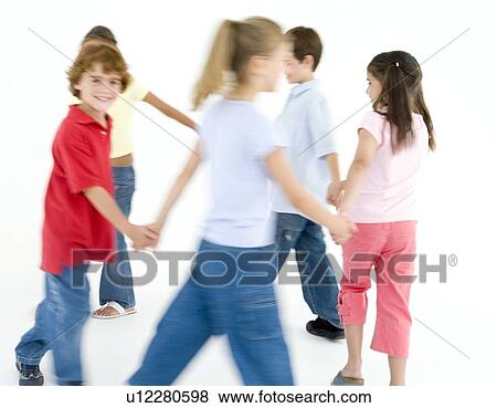 Circle of five young friends playing ring around the rosie smiling View Large Photo Image Stock Photo - Circle of five young friends playing ring around the rosie smiling. Fotosearch