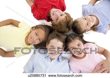 Circle of five young friends smiling View Large Photo Image Stock Image - Circle of five young friends smiling. Fotosearch