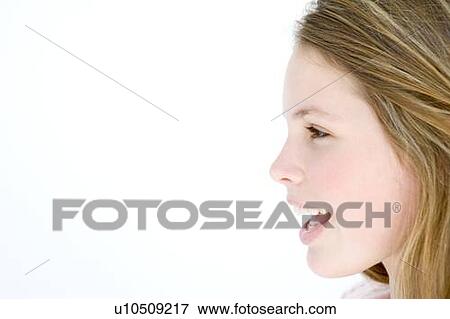 Stock Photo - Teenage girl standing with mouth open. Fotosearch