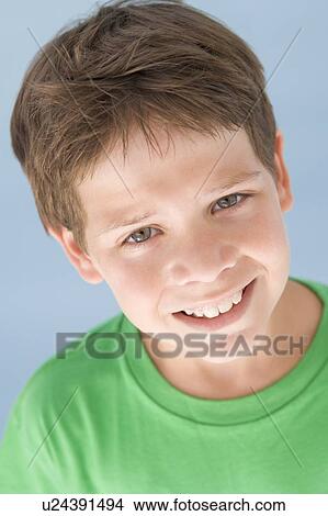 Young boy smiling View Large Photo Image Picture - Young boy smiling. Fotosearch