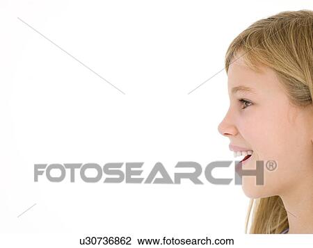 Stock Image - Young girl smiling. Fotosearch
