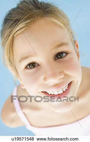 Stock Photo - Young girl smiling. Fotosearch