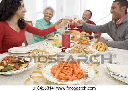 Picture - Family All Together At Christmas Dinner. Fotosearch