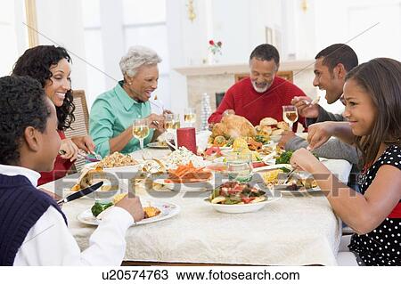 Family All Together At Christmas Dinner View Large Photo Image Stock Image - Family All Together At Christmas Dinner. Fotosearch