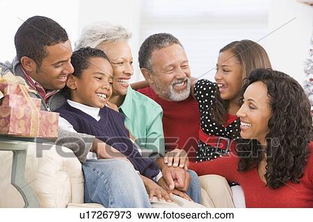 Stock Image - Family Portrait At Christmas. Fotosearch