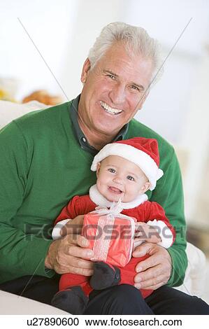 Grandfather With Baby In Santa Outfit View Large Photo Image Stock Image - Grandfather With Baby In Santa Outfit. Fotosearch