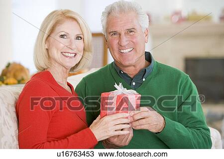 Mature Couple At Christmas View Large Photo Image Stock Image - Mature Couple At Christmas. Fotosearch