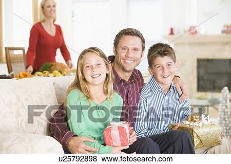 Portrait Of Family At Christmas View Large Photo Image Stock Photo - Portrait Of Family At Christmas. Fotosearch