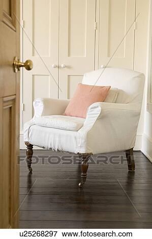 Empty chair shot through doorway View Large Photo Image Stock Photo - Empty chair shot through doorway. Fotosearch