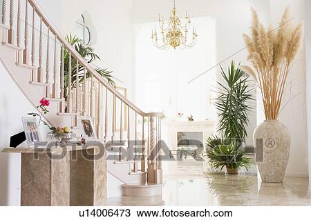 Stock Image - Empty hallway in luxurious home. Fotosearch