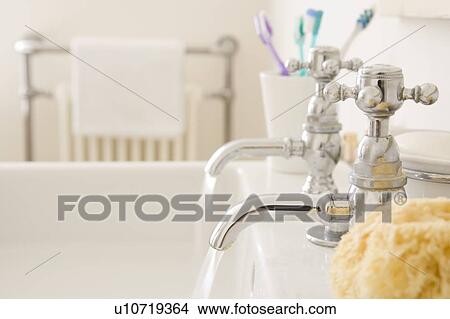 Running bathroom sink View Large Photo Image Picture - Running bathroom sink. Fotosearch