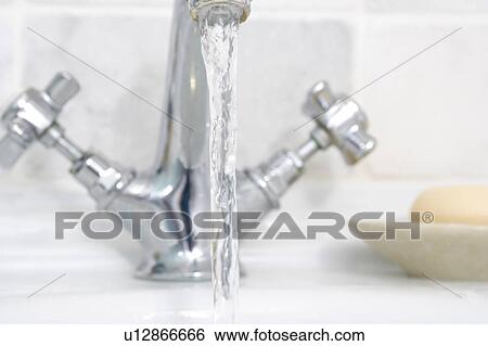 Stock Photograph - Running bathroom sink. Fotosearch
