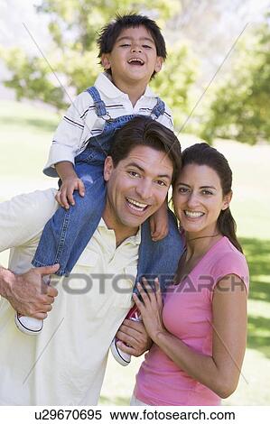 Family outdoors smiling View Large Photo Image Stock Photography - Family outdoors smiling. Fotosearch