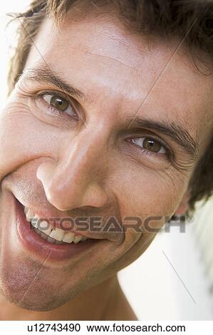 Head shot of man smiling View Large Photo Image Stock Image - Head shot of man smiling. Fotosearch