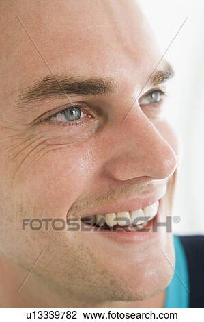 Head shot of man smiling View Large Photo Image Stock Image - Head shot of man smiling. Fotosearch