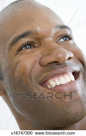 Head shot of man smiling View Large Photo Image Stock Image - Head shot of man smiling. Fotosearch
