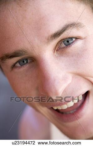 Head shot of man smiling View Large Photo Image Stock Image - Head shot of man smiling. Fotosearch