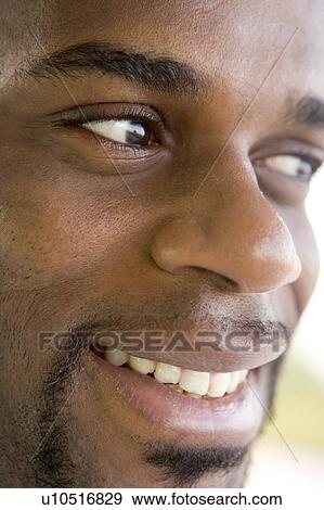 Head shot of man smiling View Large Photo Image Stock Photo - Head shot of man smiling. Fotosearch