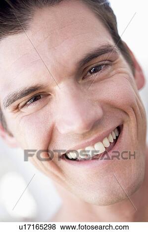 Head shot of man smiling View Large Photo Image Stock Photo - Head shot of man smiling. Fotosearch