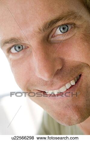 Head shot of man smiling View Large Photo Image Stock Photo - Head shot of man smiling. Fotosearch