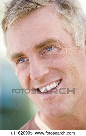 Head shot of man smiling View Large Photo Image Stock Photography - Head shot of man smiling. Fotosearch