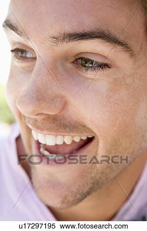 Stock Photography - Head shot of man smiling. Fotosearch