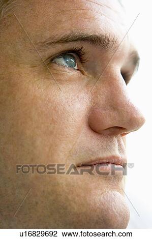 Head shot of man thinking View Large Photo Image Stock Image - Head shot of man thinking. Fotosearch