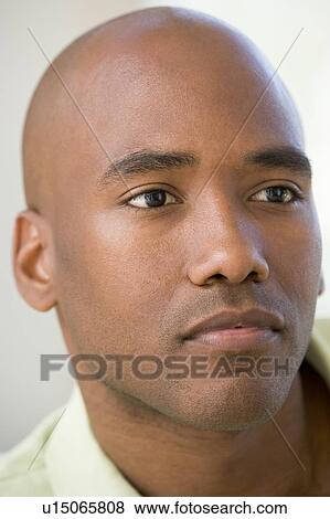 Head shot of man thinking View Large Photo Image Stock Photo - Head shot of man thinking. Fotosearch