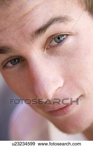 Head shot of man thinking View Large Photo Image Stock Photo - Head shot of man thinking. Fotosearch