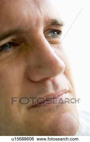 Head shot of man thinking View Large Photo Image Stock Photograph - Head shot of man thinking. Fotosearch