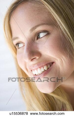 Head shot of woman smiling View Large Photo Image Stock Photo - Head shot of woman smiling. Fotosearch