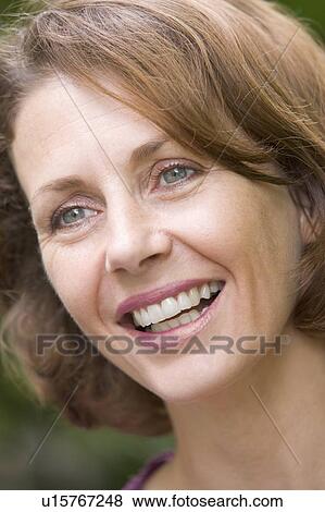 Head shot of woman smiling View Large Photo Image Stock Photo - Head shot of woman smiling. Fotosearch