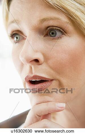 Head shot of woman thinking View Large Photo Image Stock Image - Head shot of woman thinking. Fotosearch