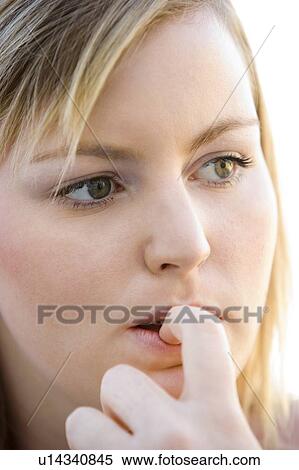 Head shot of worried woman View Large Photo Image Stock Photography - Head shot of worried woman. Fotosearch