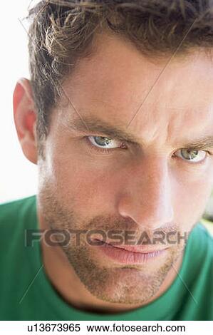 Head shot of man scowling View Large Photo Image Stock Photography - Head shot of man scowling. Fotosearch