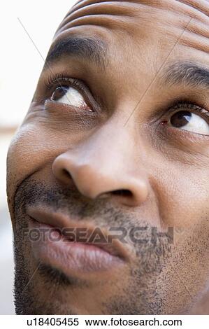 Head shot of man thinking View Large Photo Image Stock Photography - Head shot of man thinking. Fotosearch