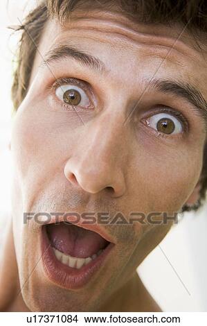 Picture - Head shot of surprised man. Fotosearch