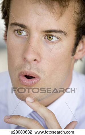 Head shot of surprised man View Large Photo Image Stock Image - Head shot of surprised man. Fotosearch