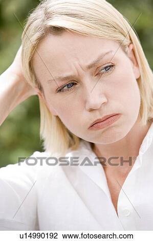 Head shot of woman scowling View Large Photo Image Stock Image - Head shot of woman scowling. Fotosearch