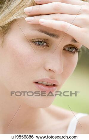 Head shot of woman scowling View Large Photo Image Stock Photograph - Head shot of woman scowling. Fotosearch