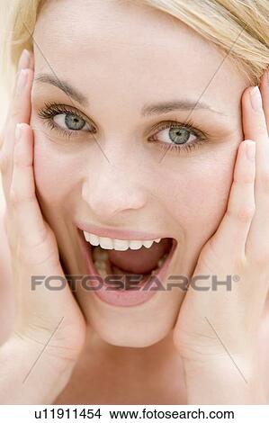 Picture - Head shot of woman smiling. Fotosearch