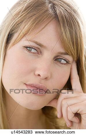 Head shot of woman thinking View Large Photo Image Stock Image - Head shot of woman thinking. Fotosearch