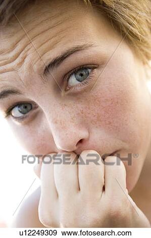 Head shot of worried woman View Large Photo Image Stock Photo - Head shot of worried woman. Fotosearch
