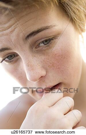 Head shot of worried woman View Large Photo Image Stock Photo - Head shot of worried woman. Fotosearch