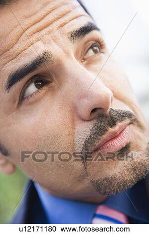 Businessman's face outdoors (selective focus) View Large Photo Image Stock Image - Businessman's face outdoors (selective focus). Fotosearch