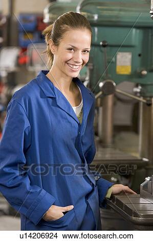 Machinist working on machine View Large Photo Image Picture - Machinist working on machine. Fotosearch