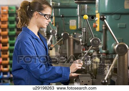 Machinist working on machine View Large Photo Image Stock Image - Machinist working on machine. Fotosearch