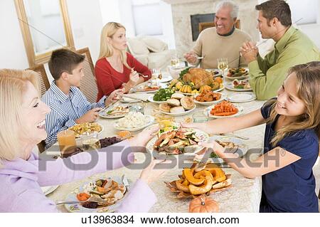 Picture - Family All Together At Christmas Dinner. Fotosearch