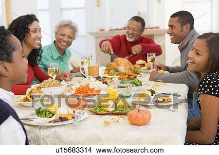 Family All Together At Christmas Dinner View Large Photo Image Picture - Family All Together At Christmas Dinner. Fotosearch